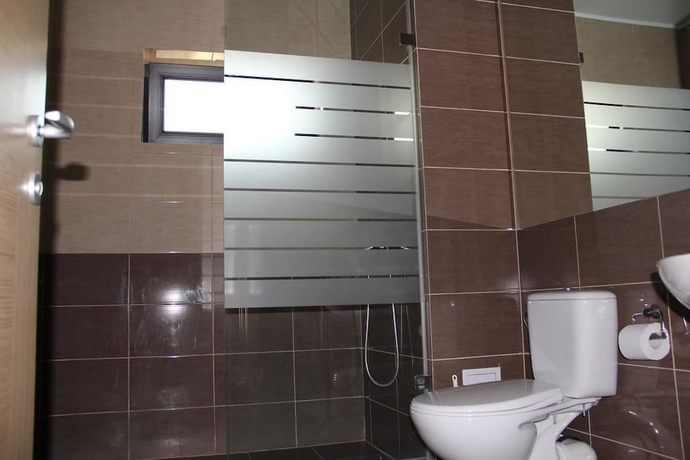Imagen de la habitación del Hotel Vila Kharisma. Foto 13
