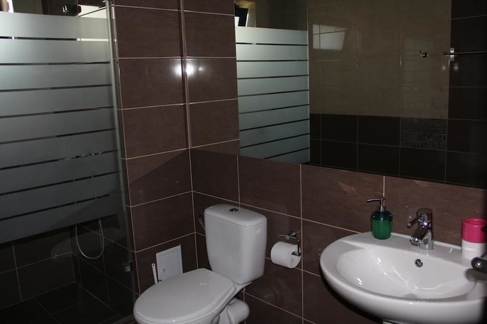 Imagen de la habitación del Hotel Vila Kharisma. Foto 15