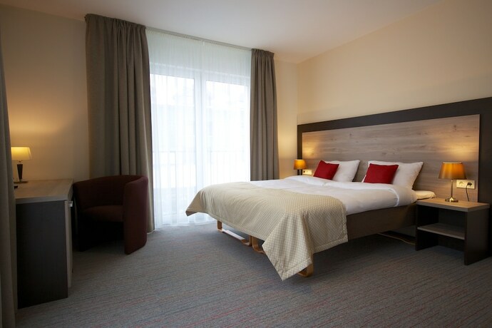 Imagen de la habitación del Hotel Vila Labas Rytas. Foto 13