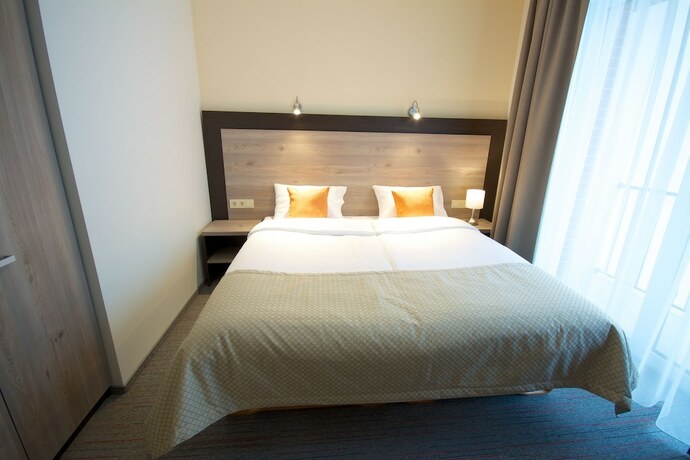 Imagen de la habitación del Hotel Vila Labas Rytas. Foto 15