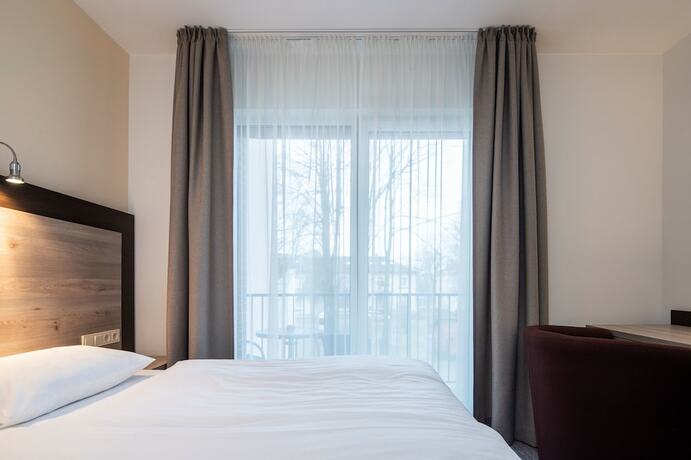 Imagen de la habitación del Hotel Vila Labas Rytas. Foto 17