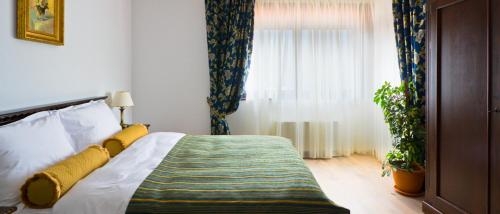 Imagen de la habitación del Hotel Vila Leonida. Foto 6