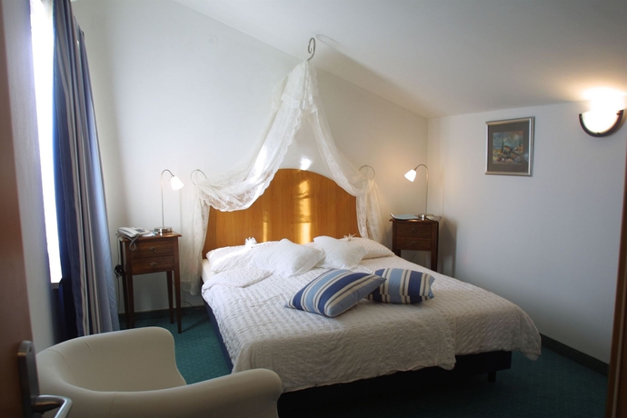 Imagen de la habitación del Hotel Vila Lili. Foto 11