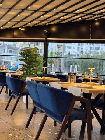 Imagen del bar/restaurante del Hotel Vila Lira. Foto 4