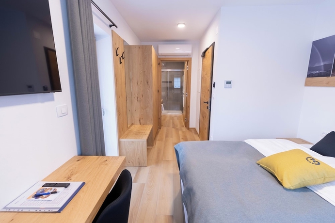 Imagen de la habitación del Hotel Vila Loka. Foto 7