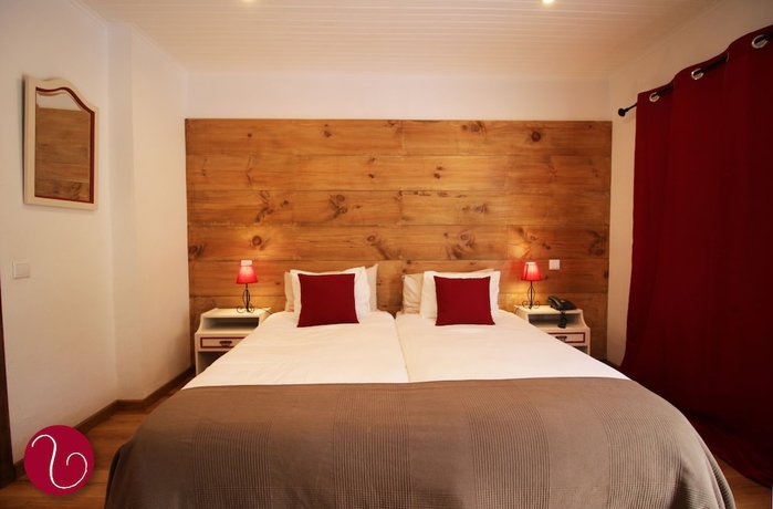 Imagen de la habitación del Hotel Vila Lusitânia. Foto 12