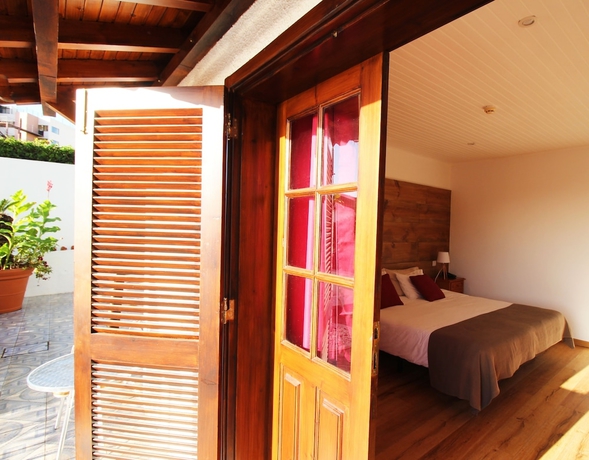 Imagen de la habitación del Hotel Vila Lusitânia. Foto 17