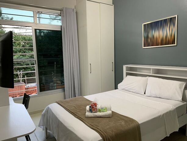 Imagen de la habitación del Hotel Vila Nina. Foto 18