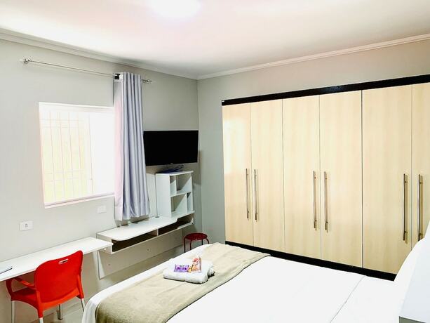 Imagen de la habitación del Hotel Vila Nina. Foto 19