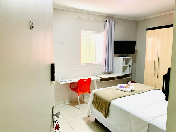 Imagen de la habitación del Hotel Vila Nina. Foto 20