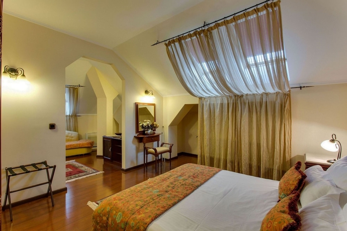 Imagen de la habitación del Hotel Vila Paris. Foto 8