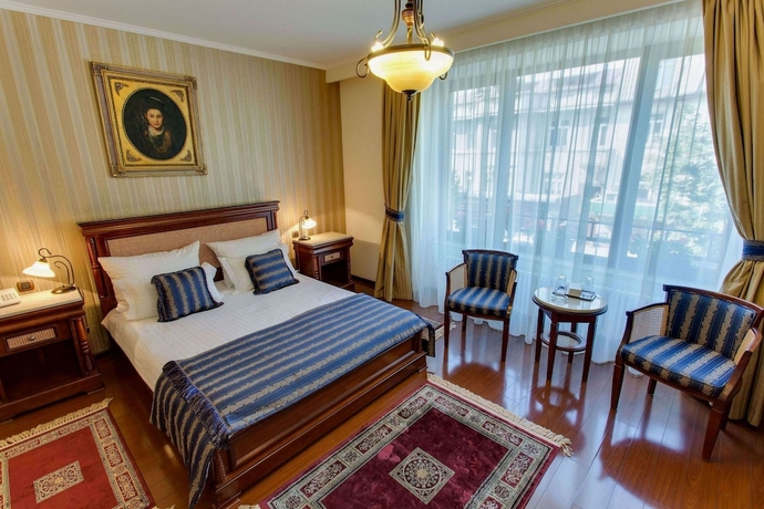 Imagen de la habitación del Hotel Vila Paris. Foto 11