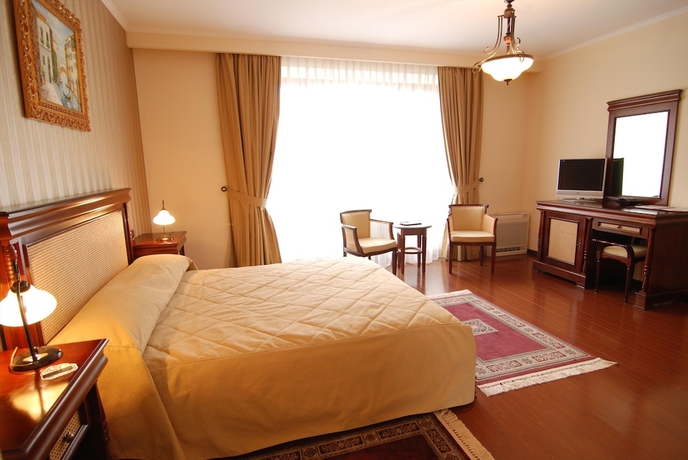 Imagen de la habitación del Hotel Vila Paris. Foto 15