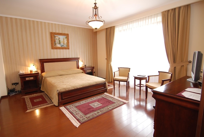 Imagen de la habitación del Hotel Vila Paris. Foto 17