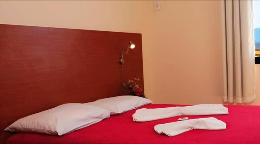 Imagen de la habitación del Hotel Vila Rica Flat. Foto 5