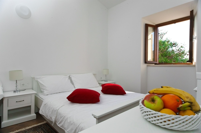 Imagen de la habitación del Hotel Vila Riva Apartments. Foto 6