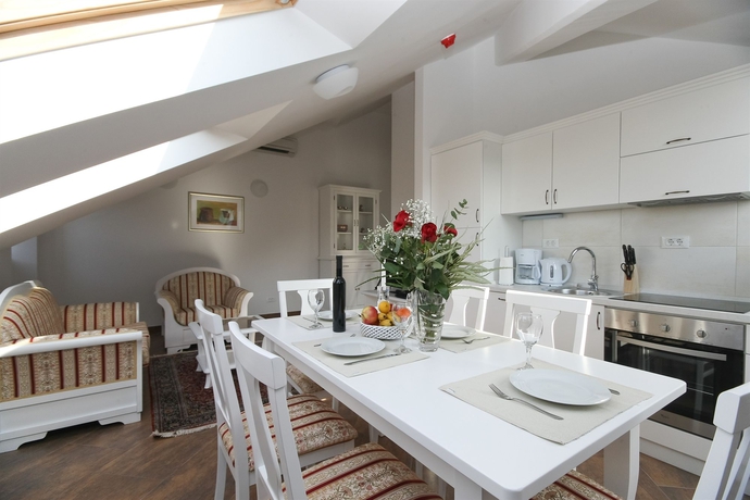 Imagen de la habitación del Hotel Vila Riva Apartments. Foto 8