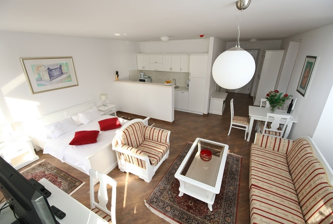 Imagen de la habitación del Hotel Vila Riva Apartments. Foto 13