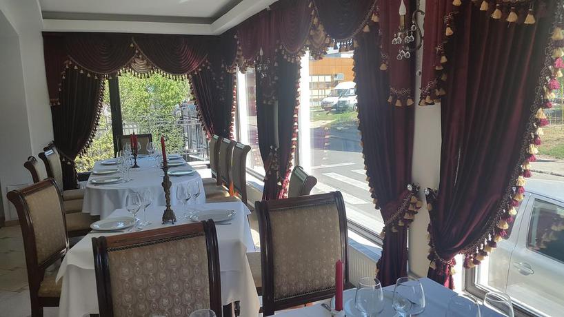 Imagen del bar/restaurante del Hotel Vila Royal, Bacau. Foto 3