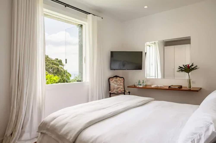 Imagen de la habitación del Hotel Vila Santa Teresa. Foto 6