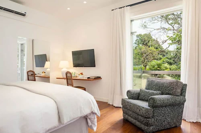 Imagen de la habitación del Hotel Vila Santa Teresa. Foto 14