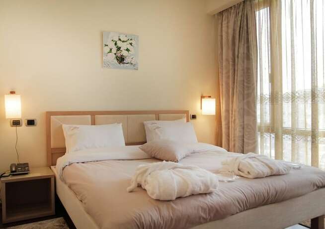 Imagen de la habitación del Hotel Vila Sharm. Foto 16