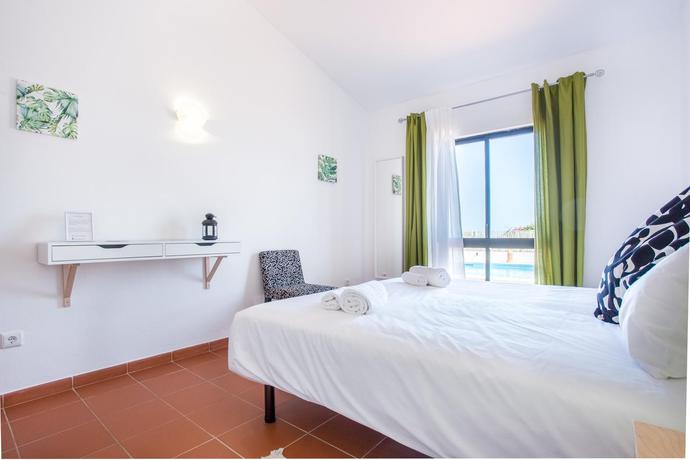 Imagen de la habitación del Hotel Vila Sta Teresinha Suites. Foto 2