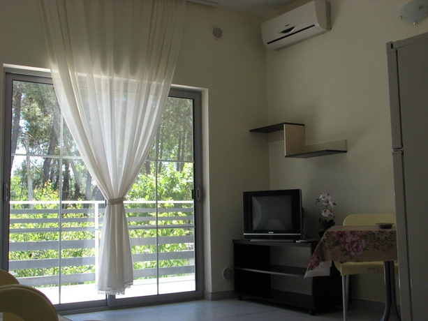Imagen de los interiores del Hotel Vila Tufi. Foto 16