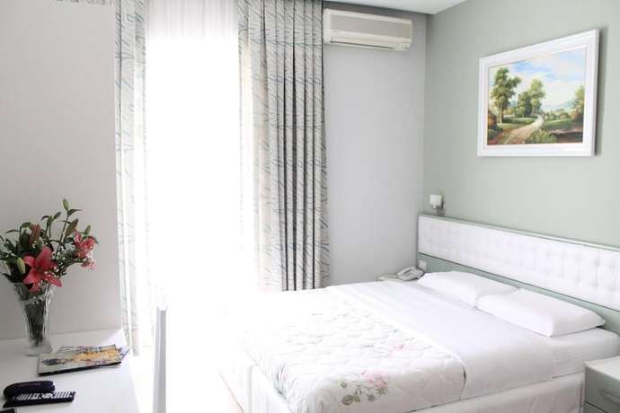 Imagen de la habitación del Hotel Vila Verde City Center. Foto 7