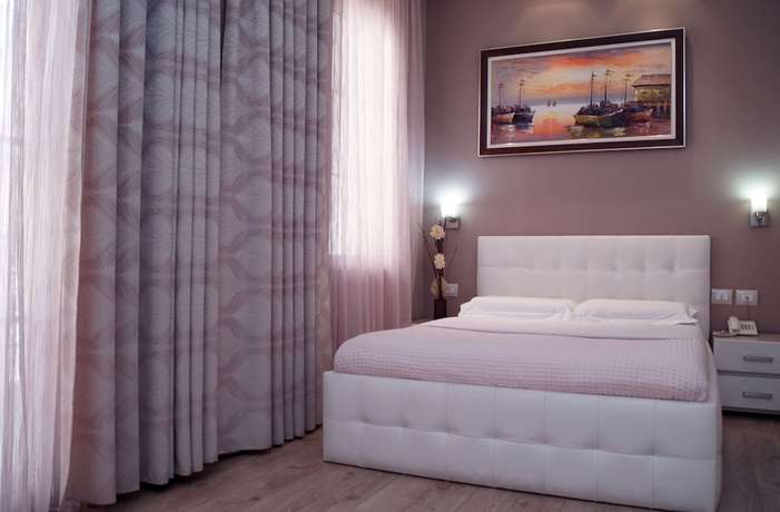 Imagen de la habitación del Hotel Vila Verde City Center. Foto 18