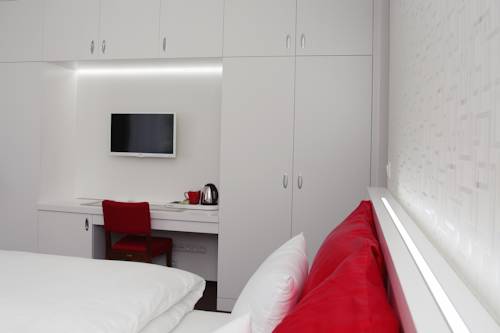 Imagen de la habitación del Hotel Vila Viola. Foto 11