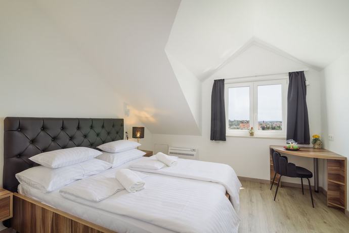 Imagen de la habitación del Hotel Vila White. Foto 6