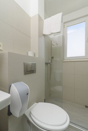 Imagen de la habitación del Hotel Vila White. Foto 7