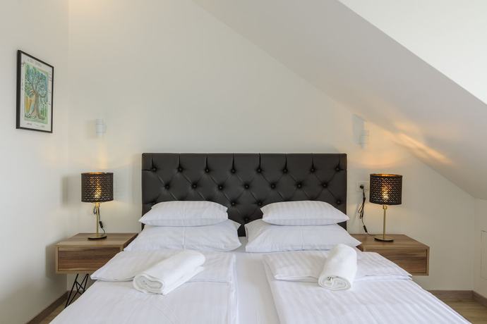 Imagen de la habitación del Hotel Vila White. Foto 10