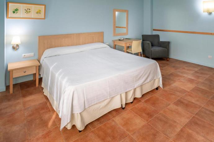 Imagen de la habitación del Hotel Vilar Rural d'Arnes. Foto 11