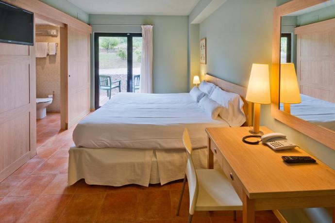 Imagen de la habitación del Hotel Vilar Rural d'Arnes. Foto 12