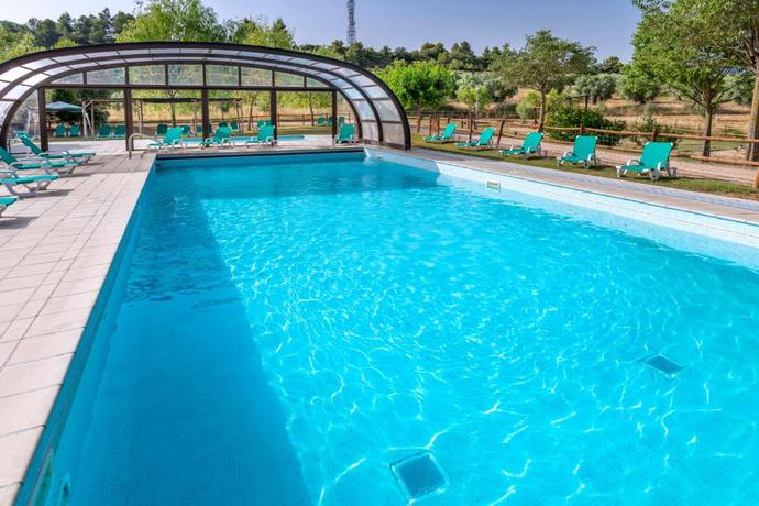 Imagen de la piscina del Hotel Vilar Rural d'Arnes. Foto 17