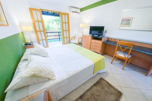 Imagen de la habitación del Hotel Vilarejo Praia. Foto 7