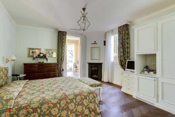 Imagen de la habitación del Hotel Villa Abbondanzi Resort. Foto 5
