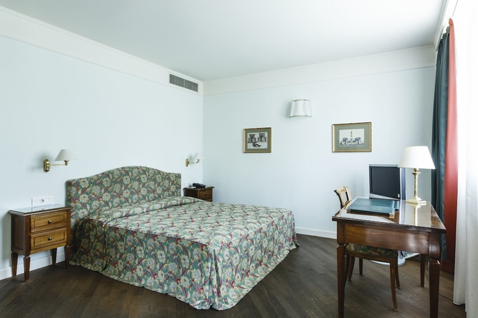 Imagen de la habitación del Hotel Villa Abbondanzi Resort. Foto 6