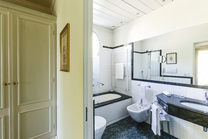 Imagen de la habitación del Hotel Villa Abbondanzi Resort. Foto 9