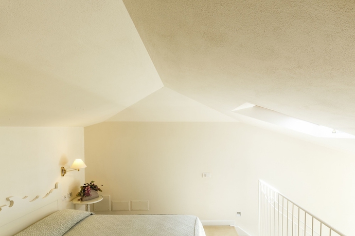 Imagen de la habitación del Hotel Villa Abbondanzi Resort. Foto 11