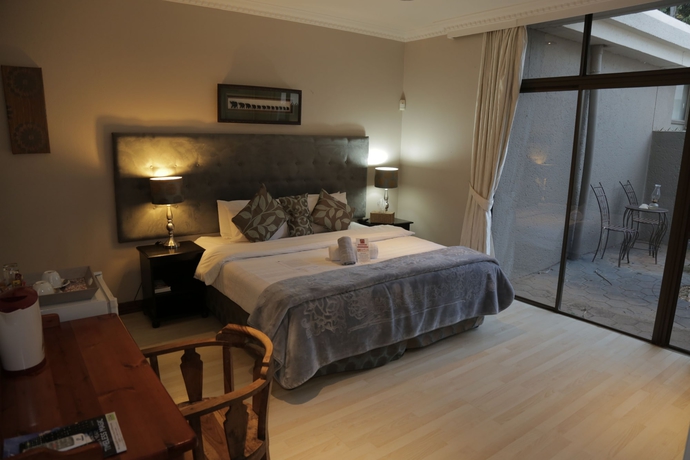 Imagen de la habitación del Hotel Villa Africa Boutique. Foto 11