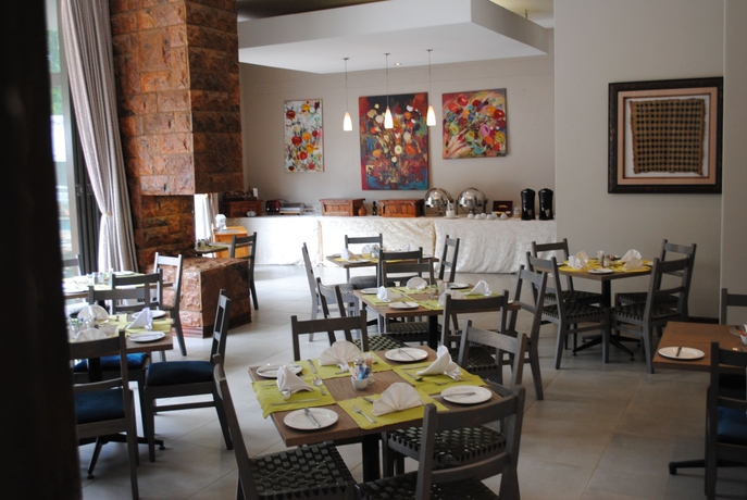 Imagen del bar/restaurante del Hotel Villa Africa Boutique. Foto 3