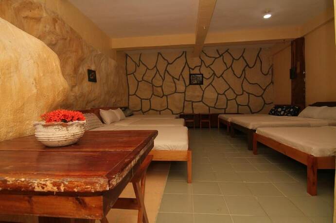 Imagen de la habitación del Hotel Villa Agatona Garden Resort. Foto 10