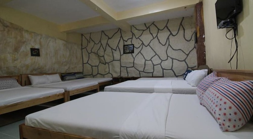 Imagen de la habitación del Hotel Villa Agatona Garden Resort. Foto 14