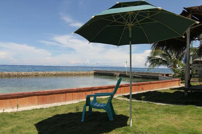 Imagen de la piscina del Hotel Villa Agatona Garden Resort. Foto 19