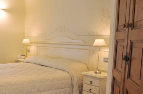 Imagen de la habitación del Hotel Villa Agnese. Foto 5