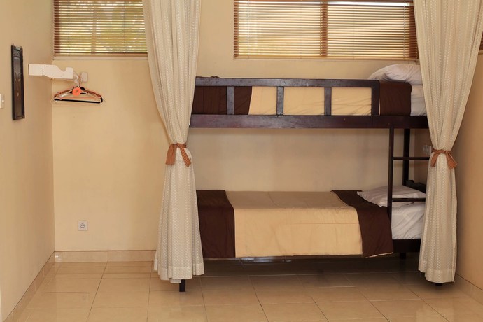 Imagen de la habitación del Hotel Villa Agung Beach Inn. Foto 9