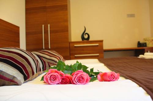 Imagen de la habitación del Hotel Villa Aina Boutique. Foto 11